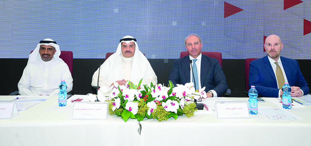 KUWAIT: Gulf Bank Chairman Jassim Mustafa Boodai (second left) chairs the Ordinary Annual General Meeting (AGM) on Tuesday.