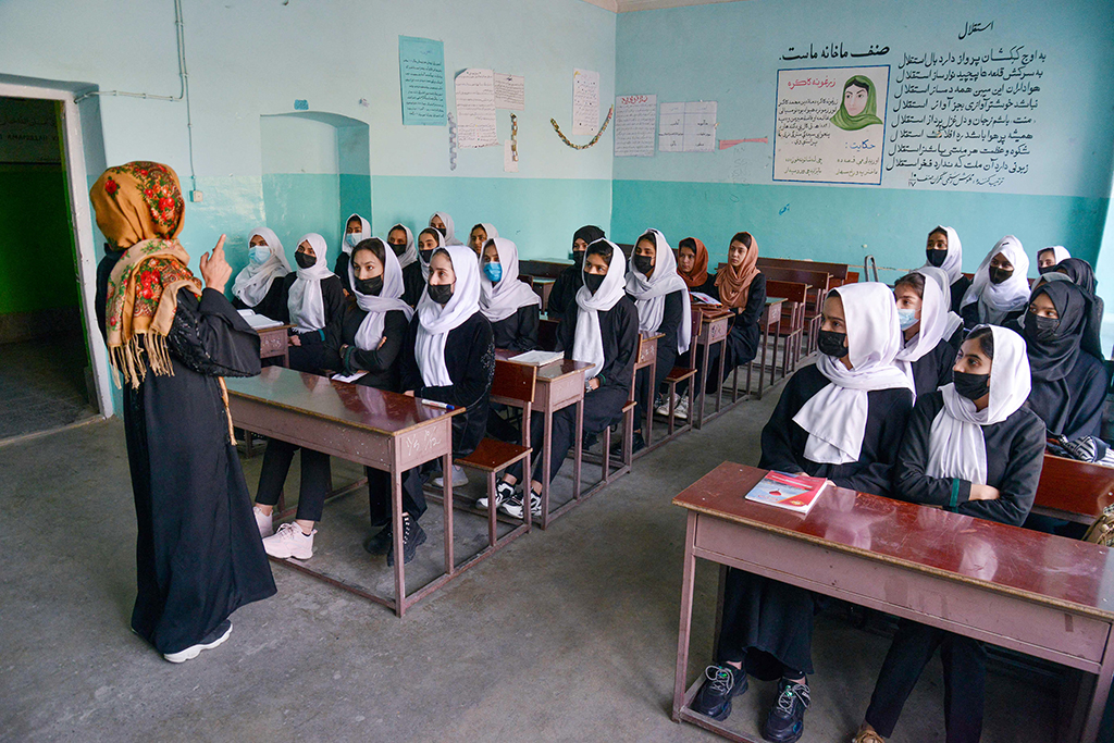 KABUL: Girls attend class after their school reopened on March 23, 2022, before closing just hours later. - AFP