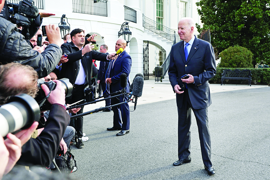 WASHINGTON: US President Joe Biden speaks to members of the press prior to a Marine One departure from the White House on March 23, 2022 in Washington, DC. – AFP