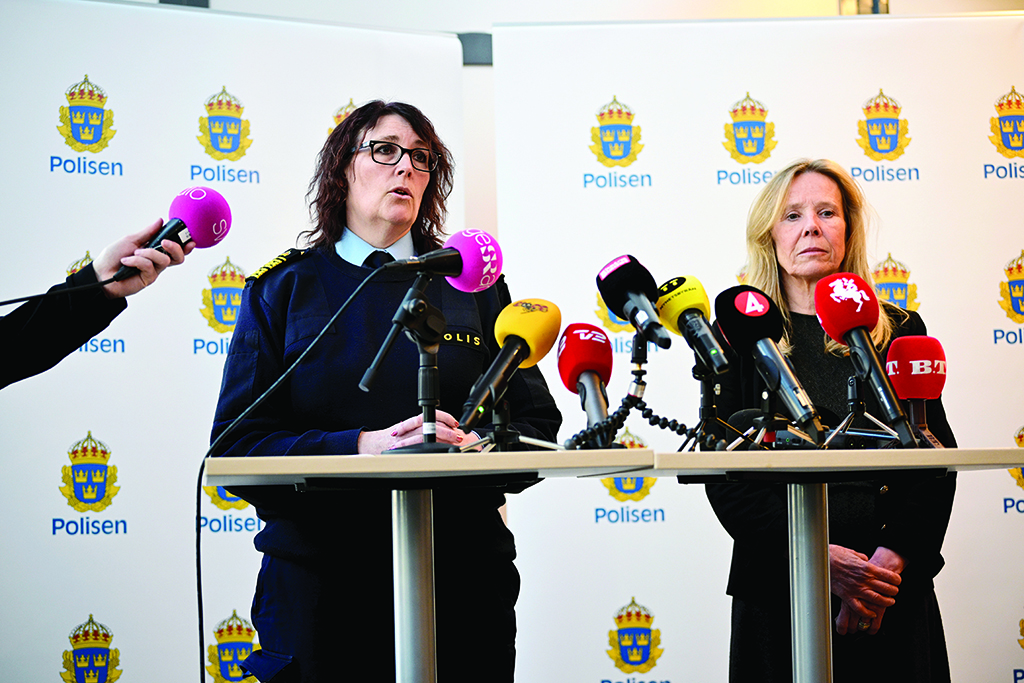MALMO, Sweden: Swedish Chief of Malmo Police Petra Stenkula (2nd L) and Director of High School and Adult Education Annelie Schwartz hold a press conference at the Malmo Latin School on March 22, 2022 in Malmo, Sweden, a day after two women were killed. - AFP
