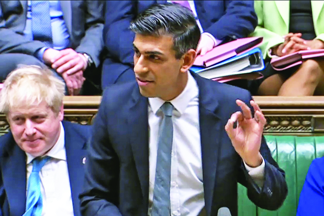 LONDON: A video grab from footage broadcast by the UK Parliament's Parliamentary Recording Unit (PRU) shows Britain's Chancellor of the Exchequer Rishi Sunak gesturing as he presents the Spring budget statement to MPs at the House of Commons, in London on March 23, 2022. -- AFP