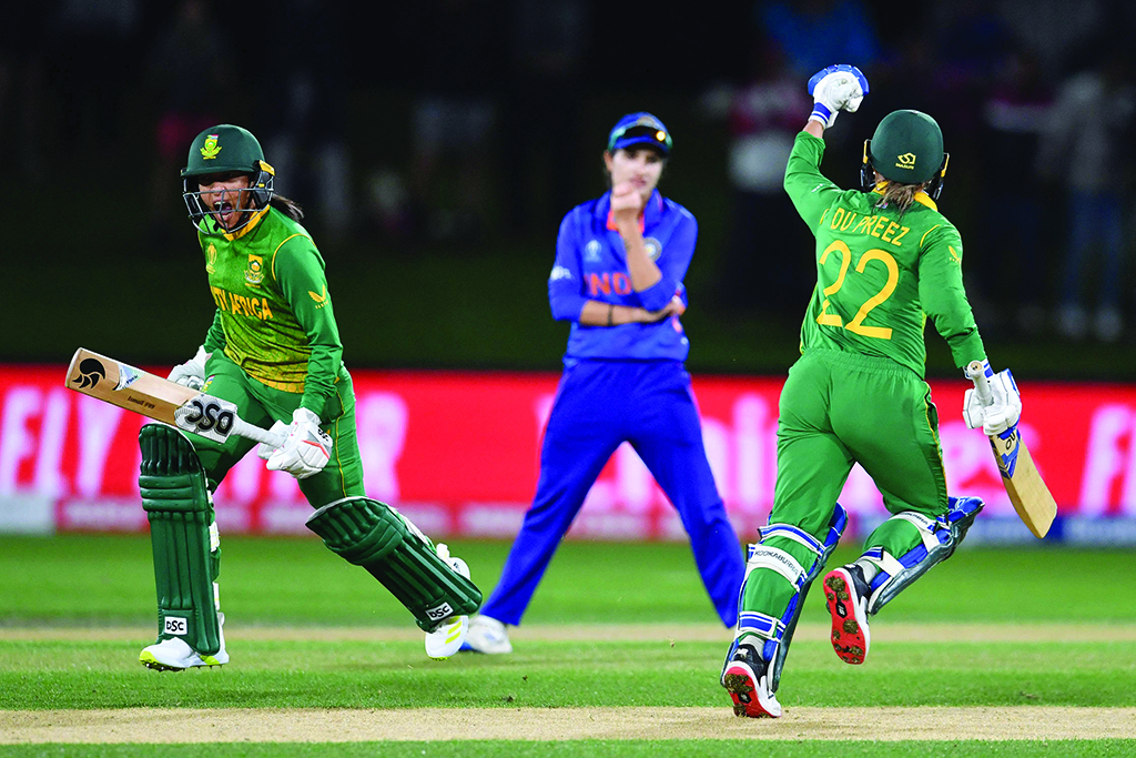 CHRISTCHURCH: South Africa's Mignon du Preez (right) and Shabnim Ismail celebrate the match winning run during the Women's Cricket World Cup match between South Africa and India at Hagley Oval in Christchurch on March 27, 2022. - AFP